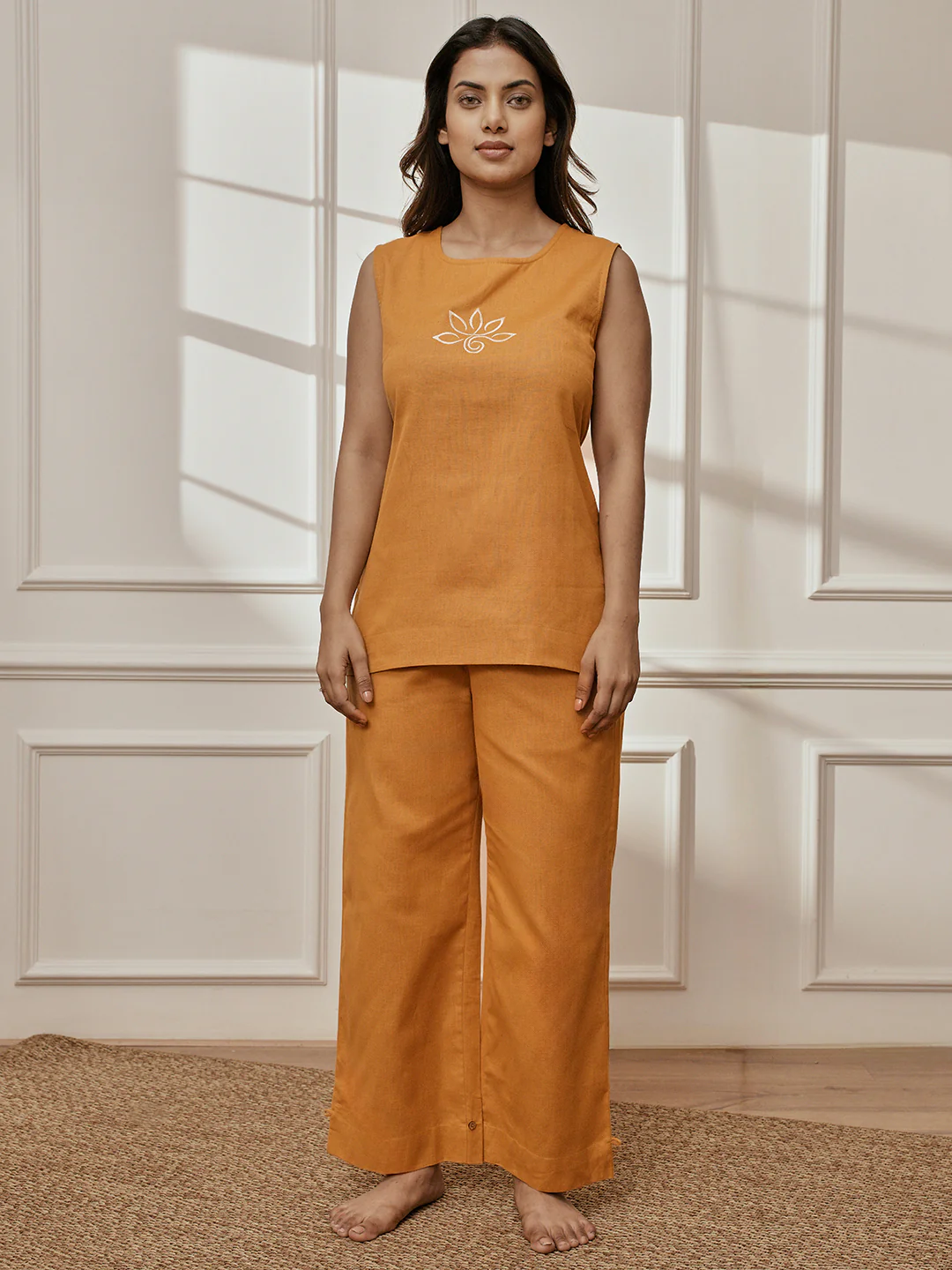 Women's Dusty Saffron Ethnic Embroidered Yoga Sleeveless Kurta With Straight Pants - Image 3